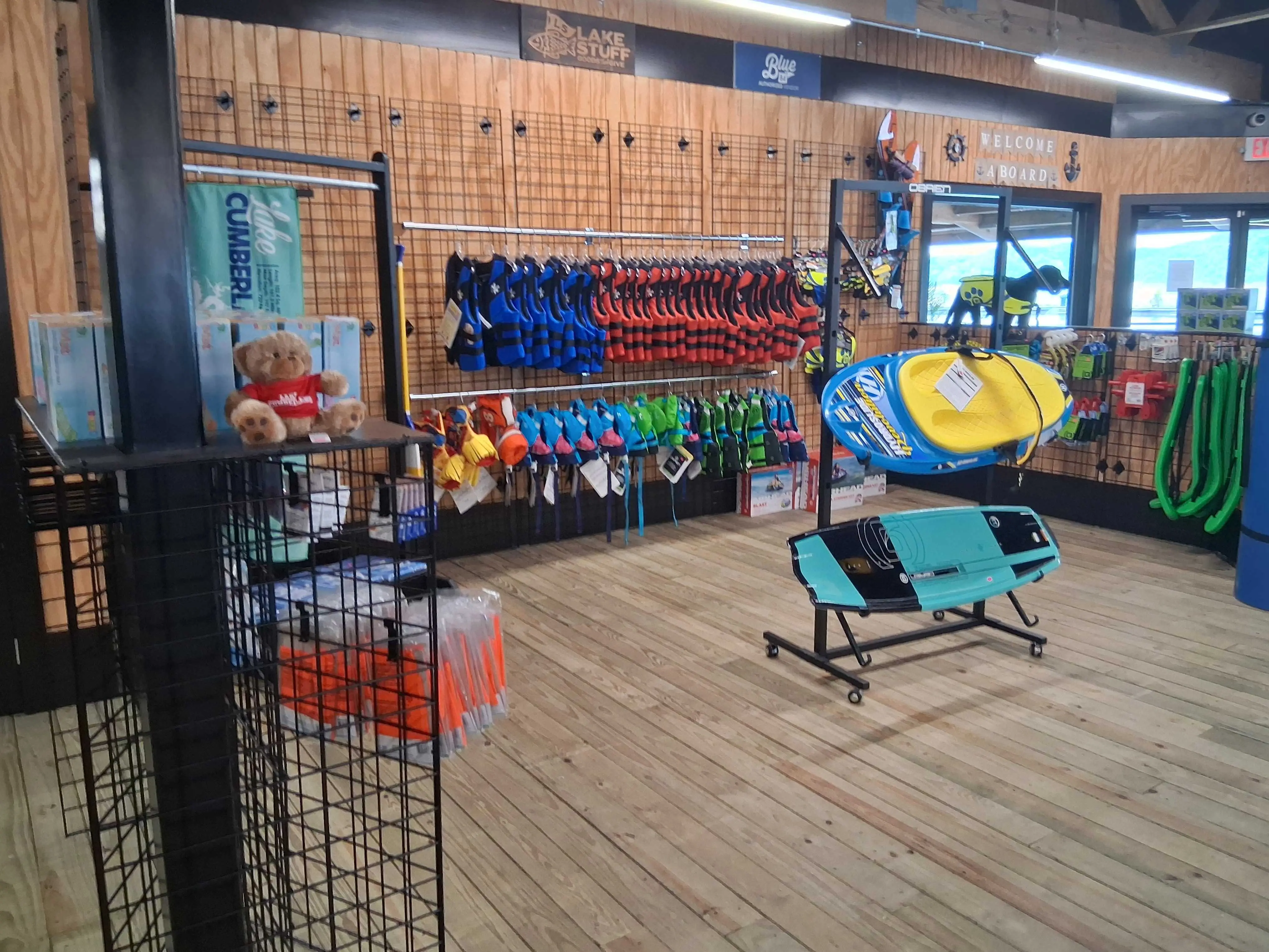 Ship's store at Marina Rowena with life jackets, paddle boards, and lake gear