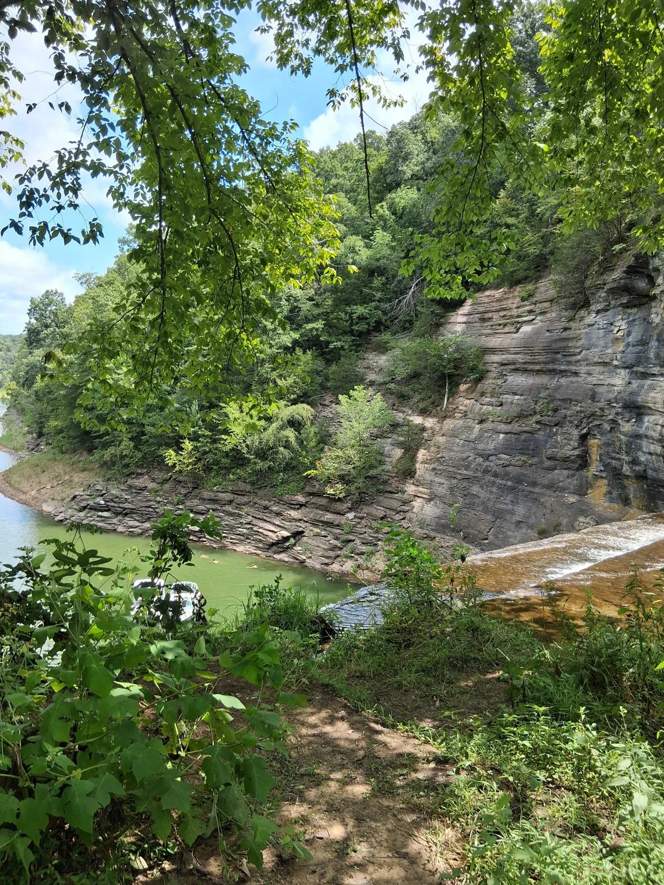 Top of 76 Falls — cliff face and lake below